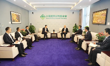 阎晓峰会见天山材料董事长赵新军一行